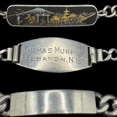 Sale Photo Thumbnail #802: **WIRE TRANSFER IS REQUIRED IF SHIPPED.** [92.33g] Includes an Asian themed ID style bracelet, a plain ID bracelet, and a personalized ID bracelet. Total of three pieces. Measurement of longest: 8”. Silver content confirmed using Niton XRF precious meta