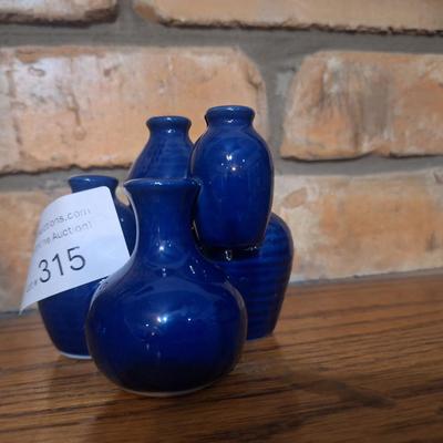 Sale Photo Thumbnail #1334: ceramic cluster of miniature blue  vases