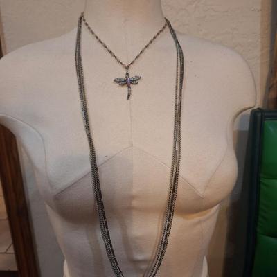 Sale Photo Thumbnail #1376: 1 very long multi strand necklace and a shorter one with dragonfly pendant.