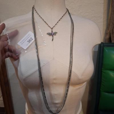 Sale Photo Thumbnail #1377: 1 very long multi strand necklace and a shorter one with dragonfly pendant.