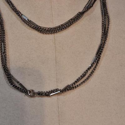 Sale Photo Thumbnail #1378: 1 very long multi strand necklace and a shorter one with dragonfly pendant.