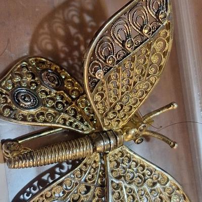 Sale Photo Thumbnail #1382: We can't find the marking for sterling but did find the AC marking.  This brooch is expected to be sterling silver .  The wings are hinged and will move.