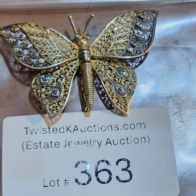 Sale Photo Thumbnail #1380: We can't find the marking for sterling but did find the AC marking.  This brooch is expected to be sterling silver .  The wings are hinged and will move.