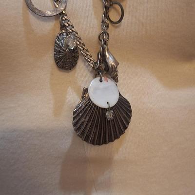 Sale Photo Thumbnail #1392: Vintage signed Chicos silver tone shell conch necklace