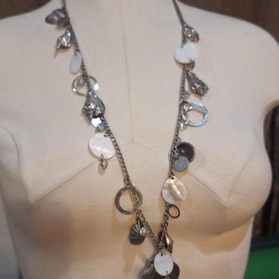 Sale Photo Thumbnail #1391: Vintage signed Chicos silver tone shell conch necklace