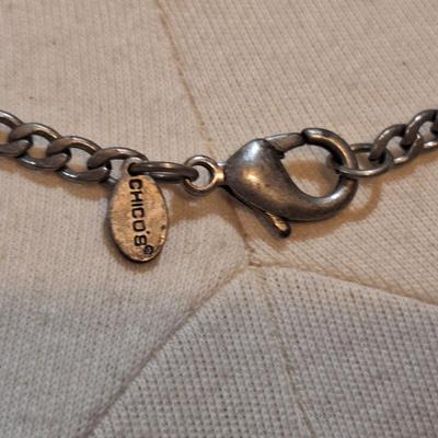 Sale Photo Thumbnail #1393: Vintage signed Chicos silver tone shell conch necklace