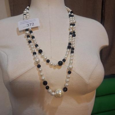 Sale Photo Thumbnail #1415: Black and white beaded necklace