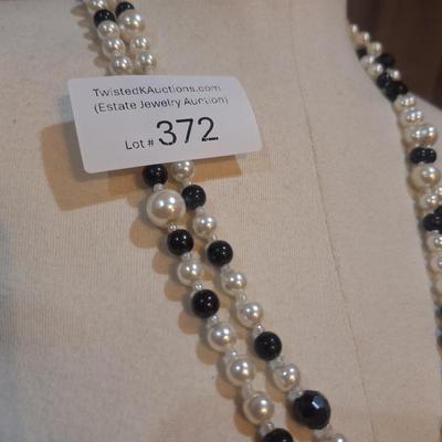 Sale Photo Thumbnail #1417: Black and white beaded necklace