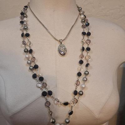 Sale Photo Thumbnail #1418: the beaded one is really long it is doubled over in the photos. 