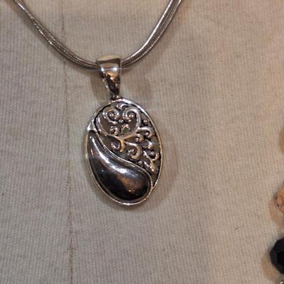 Sale Photo Thumbnail #1421: the beaded one is really long it is doubled over in the photos. 