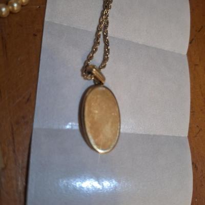 Sale Photo Thumbnail #1462: not likely real pearls