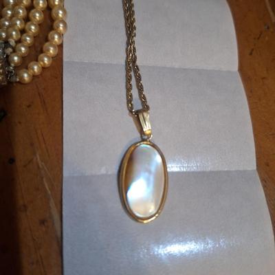 Sale Photo Thumbnail #1461: not likely real pearls