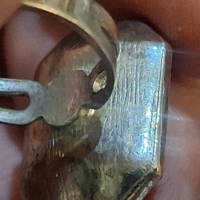 Sale Photo Thumbnail #1491: it looks like it might be sterling but there are no markings,  