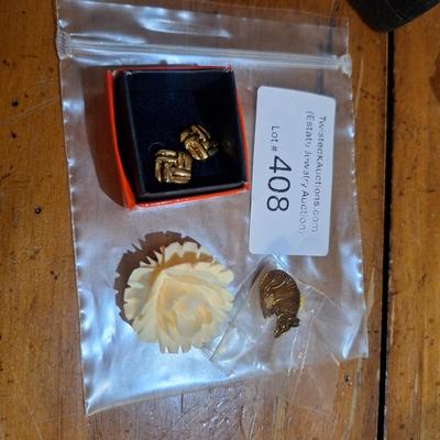Sale Photo Thumbnail #1587: vintage jewelry, carved rose brooch, armadillo lapel pin and earrings.