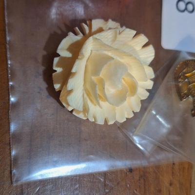 Sale Photo Thumbnail #1589: vintage jewelry, carved rose brooch, armadillo lapel pin and earrings.