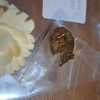 Sale Photo Thumbnail #1590: vintage jewelry, carved rose brooch, armadillo lapel pin and earrings.
