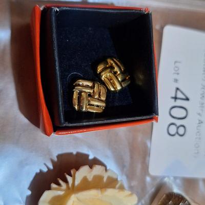 Sale Photo Thumbnail #1588: vintage jewelry, carved rose brooch, armadillo lapel pin and earrings.