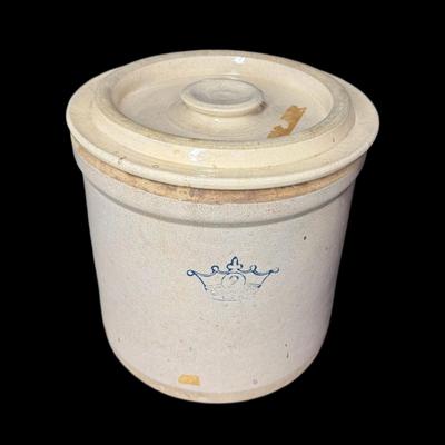 Sale Photo Thumbnail #806: Two gallon capacity (#2). No obvious cracks. The logo has wear. The lid may not be original to the crock. [AG]