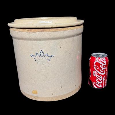 Sale Photo Thumbnail #809: Two gallon capacity (#2). No obvious cracks. The logo has wear. The lid may not be original to the crock. [AG]