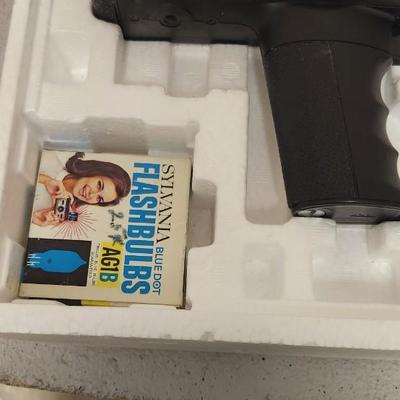 Sale Photo Thumbnail #235: Bell and Howell 2123 XL super 8 movie camera in original box. Fits large flat rate box