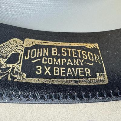 Sale Photo Thumbnail #817: Retailed by Parker’s of Reno, Nevada. This hat has a multi-colored feather hat band. Age related wear. Size 7.5. [CS]