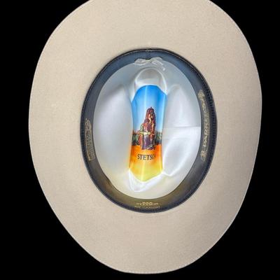 Sale Photo Thumbnail #816: Retailed by Parker’s of Reno, Nevada. This hat has a multi-colored feather hat band. Age related wear. Size 7.5. [CS]