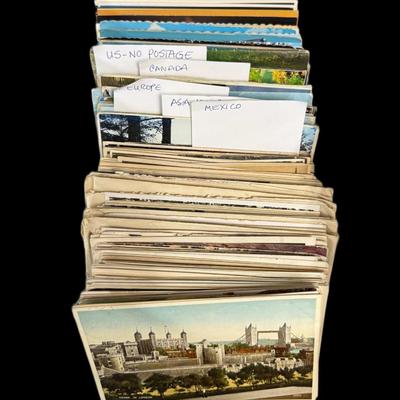 Sale Photo Thumbnail #820: Includes hundreds of postcards. Some are used, with vintage stamps. [CS]
