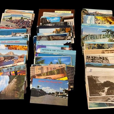 Sale Photo Thumbnail #822: Includes hundreds of postcards. Some are used, with vintage stamps. [CS]