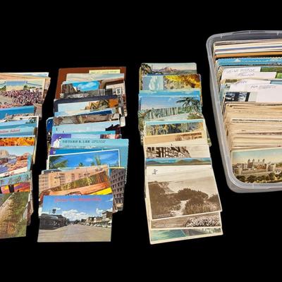 Sale Photo Thumbnail #819: Includes hundreds of postcards. Some are used, with vintage stamps. [CS]