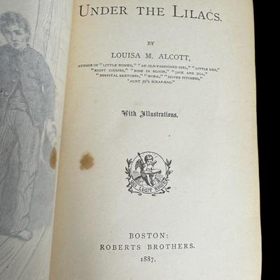 Sale Photo Thumbnail #828: Includes the Works of Edgar Allen Poe (eight books); and a series by Louisa M. Alcott (Little Women, Little Men, Jo’s Boys, Under the Lilacs, and Rose in Bloom). Total of 13 books. Age related wear. [CS]