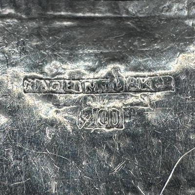 Sale Photo Thumbnail #831: **WIRE TRANSFER IS REQUIRED IF SHIPPED.** [34.72g] Includes a sterling marcasite ring, a sterling ankle bracelet with a State of Maine charm, and a South American panel bracelet in .900 silver. Total of three pieces. Measurement of longest: 10”. Age rel