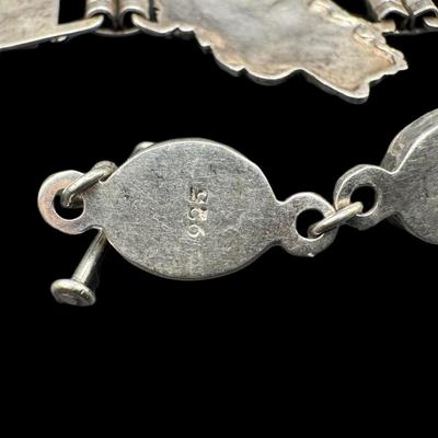 Sale Photo Thumbnail #837: **WIRE TRANSFER IS REQUIRED IF SHIPPED.** [52.15g] Includes a garnet cabochon bracelet, a prong set citrine bracelet, and a Danish style leaf motif bracelet. Total of three pieces. Measurement of longest: 8”. Silver content confirmed using Niton XRF pre