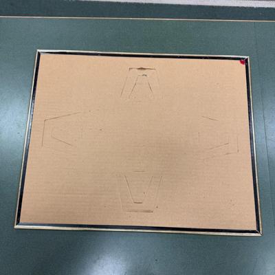 Sale Photo Thumbnail #37: Framed Print titled "Dreamin" By Michael Swanson.  It depicts Elvis Presley, Marilyn Monroe and James Dean in a 1959 Pink Cadillac Eldorado Convertible cruising along Route 66 at sunset
Approximately 16"x20"