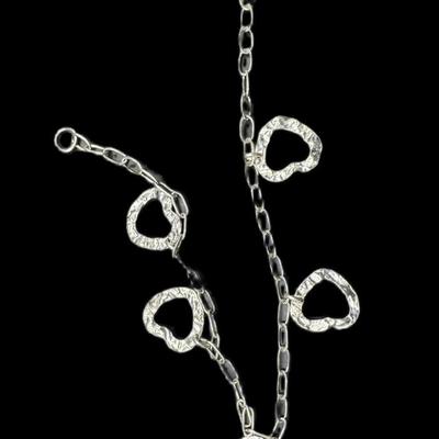 Sale Photo Thumbnail #841: **WIRE TRANSFER IS REQUIRED IF SHIPPED.** [22.20g] Includes a vintage heart perfume bottle, and a floating heart ankle bracelet. Total of two pieces. Age related wear. Silver content confirmed using Niton XRF precious metals analyzer. **ALL PRECIOUS METAL