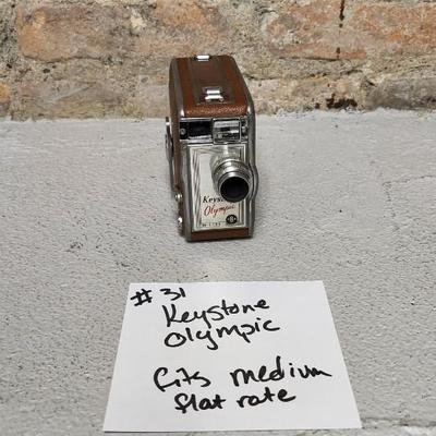 Sale Photo Thumbnail #303: Keystone Olympic movie camera. Fits a medium flat rate box.