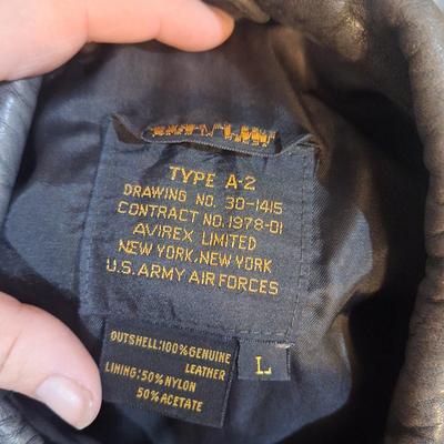 Sale Photo Thumbnail #1612: authentic military leather jacket from an estate of retired Air Force Veteran. Y ou'll find these on ebay for $200+   it has been worn a lot and there are some damage to the non leather areas like the cuffs and waist but overall it is a great vintage find
