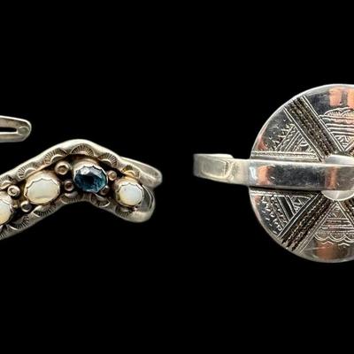 Sale Photo Thumbnail #849: **WIRE TRANSFER IS REQUIRED IF SHIPPED.** [53.48g] Includes a bezel set moonstone and topaz cuff, and a Tuareg style cuff. Total of two pieces. Measurement: 2.5” Diameter (each). Silver content confirmed using Niton XRF precious metals analyzer. **ALL P