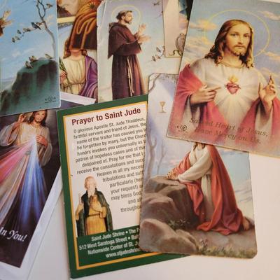 Sale Photo Thumbnail #366: This auction lot is for a collection of various Holy Cards.  These cards run the gamut - from saints to icons of the Christian beliefs. Many contain prayers and some have funeral memorials on the verso. About 20 cards.