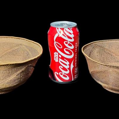 Sale Photo Thumbnail #865: Two pieces. These reticulated, or woven, copper baskets have a light patina. There is age related wear. Measurement: 3”H x 7” Diameter (each), [CS]