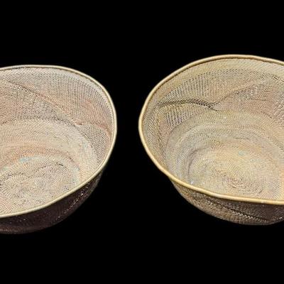 Sale Photo Thumbnail #863: Two pieces. These reticulated, or woven, copper baskets have a light patina. There is age related wear. Measurement: 3”H x 7” Diameter (each), [CS]