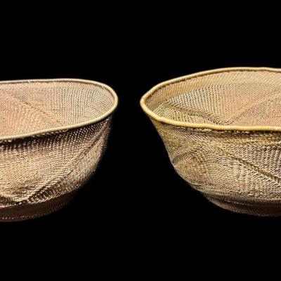 Sale Photo Thumbnail #864: Two pieces. These reticulated, or woven, copper baskets have a light patina. There is age related wear. Measurement: 3”H x 7” Diameter (each), [CS]
