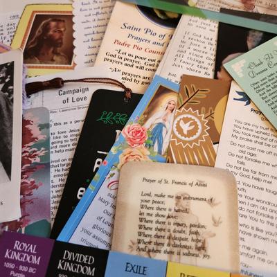 Sale Photo Thumbnail #372: This auction lot is for a collection of Religious Ephemera and Three Rosaries. Contains bookmarks, prayer cards and other interesting printed media reflecting Christian culture. Plus three nice rosaries still in the original wrapping.
