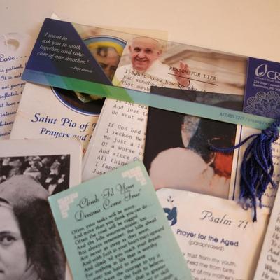 Sale Photo Thumbnail #370: This auction lot is for a collection of Religious Ephemera and Three Rosaries. Contains bookmarks, prayer cards and other interesting printed media reflecting Christian culture. Plus three nice rosaries still in the original wrapping.