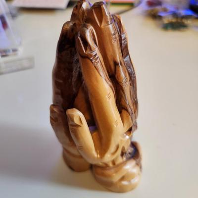 Sale Photo Thumbnail #385: This auction lot is for a Carved Wood Praying Hand Statue. Interesting and quite dimensional. Appears to be carved from cedar wood.