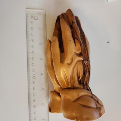 Sale Photo Thumbnail #384: This auction lot is for a Carved Wood Praying Hand Statue. Interesting and quite dimensional. Appears to be carved from cedar wood.