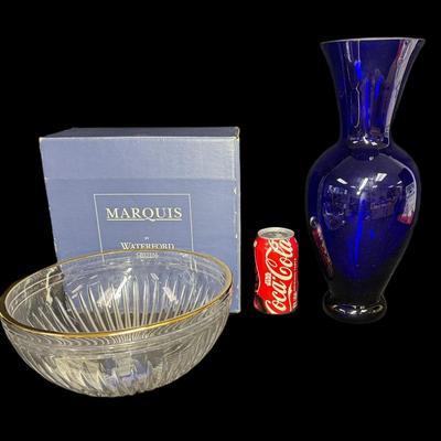 Sale Photo Thumbnail #877: Includes a Waterford Marquis Hanover Gold crystal bowl, and a Block Crystal of Stockholm cobalt blue vase. Total of two pieces. Age related wear. Measurement of largest: 15”H. [CS]