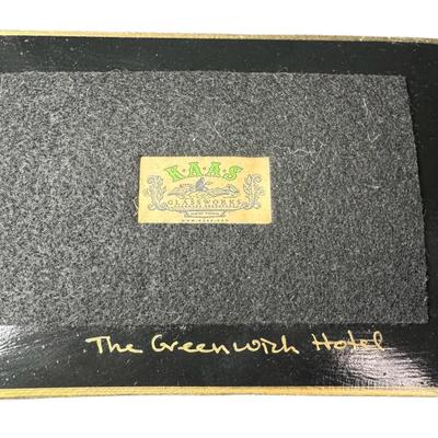 Sale Photo Thumbnail #886: Includes a carved jade fisherman, a Noah cow bell, a Robert De Niro signed painting, a Kaas Glassworks trinket dish, and more. Total of five pieces. Measurement of largest: 12”L. [CS]