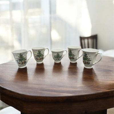 Sale Photo Thumbnail #23: Nikko Happy Holidays Christmas Tree Footed Cups, Saucers and Large Plate.  4 large cups, one small cup, four saucers and one dinner plate.
Made in Japan.