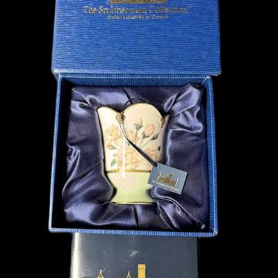 Sale Photo Thumbnail #907: Includes a Jim Beam crappie fish decanter, a cast iron mechanical horse bank, a Jim Shore Heartwood Creek statue, a Smithsonian Goebel tealight in the original box, and a Willow Tree Warm Embrace statue. Total of five pieces. Measurement of longest: 13”