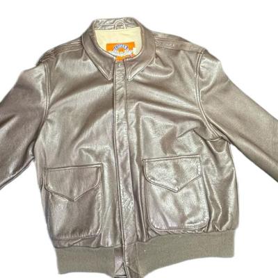 Sale Photo Thumbnail #918: A depiction of the 50th Anniversary of the close of WW2 is on the inside. The jacket was made in USA, in 1995. Size is 44R. [CS]